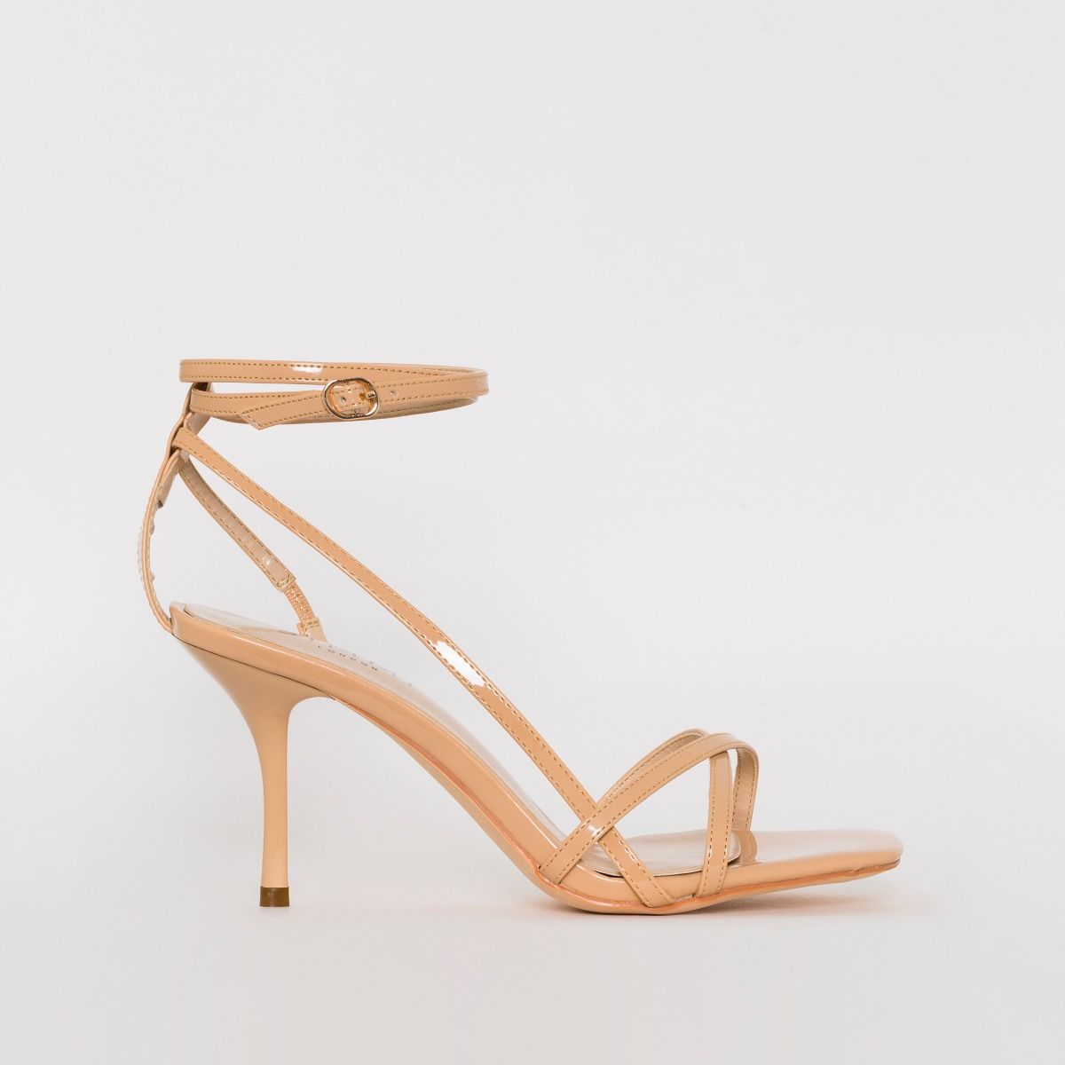 nude patent strappy heels