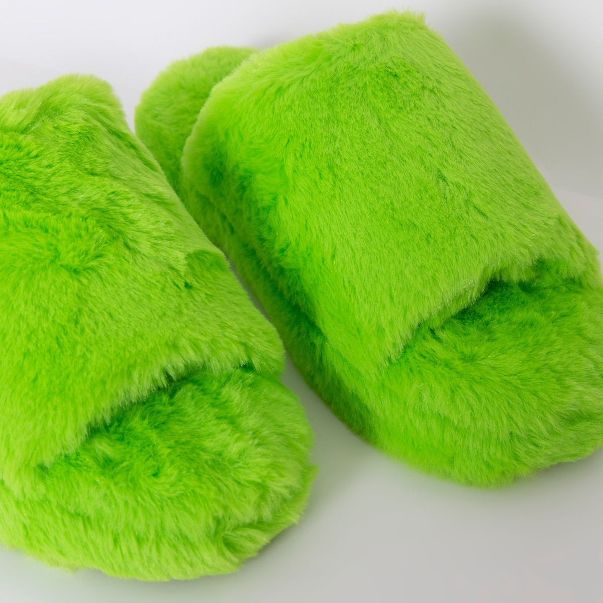 green fluffy slippers
