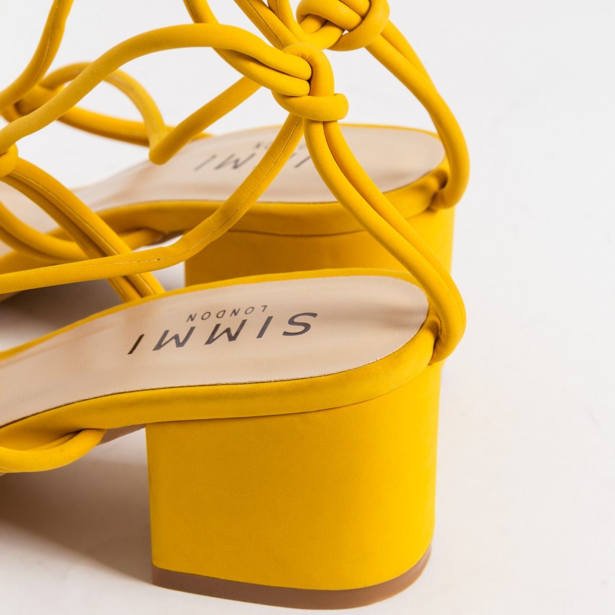yellow lace up block heels